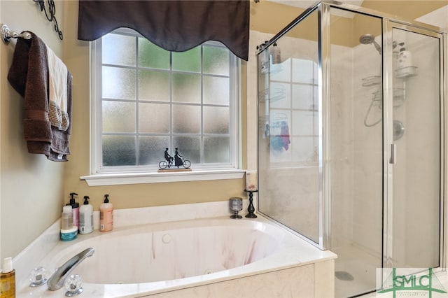 bathroom with shower with separate bathtub