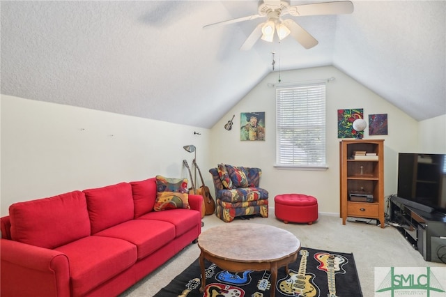 carpeted living room with a textured ceiling, ceiling fan, and lofted ceiling