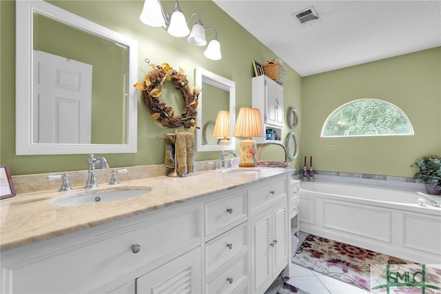 bathroom with tile patterned flooring, visible vents, a sink, and double vanity