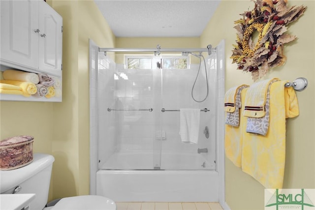 full bath featuring a textured ceiling, shower / bath combination with glass door, and toilet