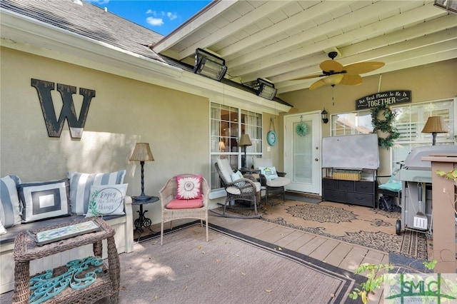 view of patio with a ceiling fan