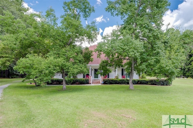 view of front of home with a front yard