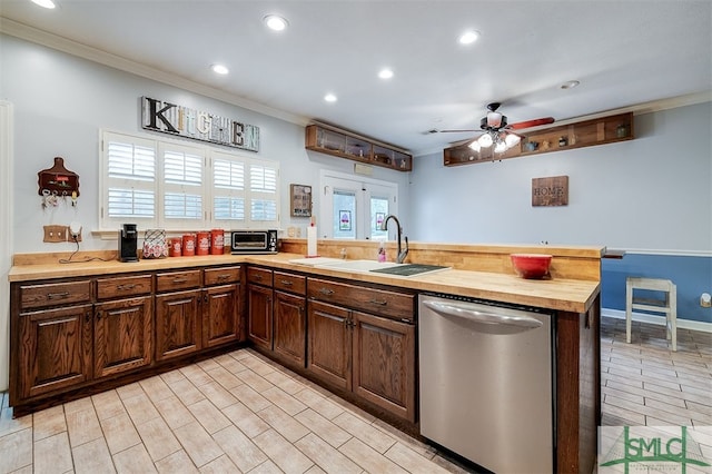 kitchen with dishwasher, light hardwood / wood-style floors, wooden counters, ceiling fan, and ornamental molding