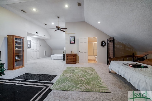 carpeted bedroom with ceiling fan, ensuite bathroom, a textured ceiling, and vaulted ceiling