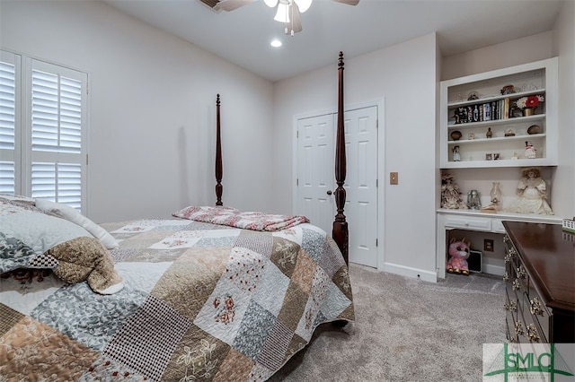 carpeted bedroom with a closet and ceiling fan