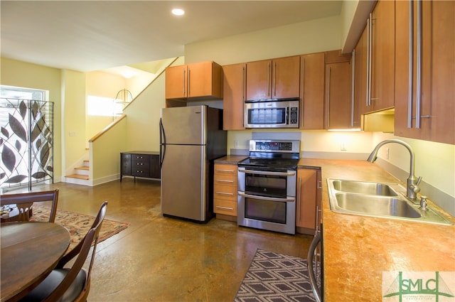 kitchen with appliances with stainless steel finishes and sink