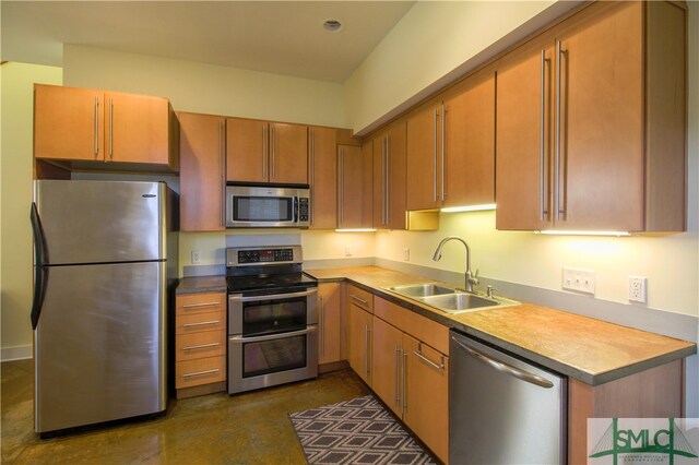 kitchen with stainless steel appliances and sink