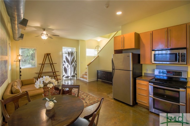 kitchen with appliances with stainless steel finishes and ceiling fan