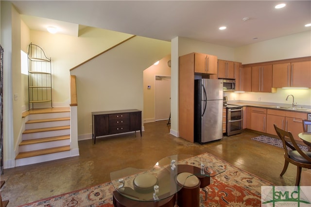 kitchen featuring appliances with stainless steel finishes and sink