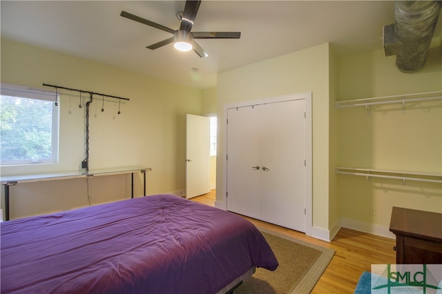 bedroom featuring ceiling fan and light hardwood / wood-style floors