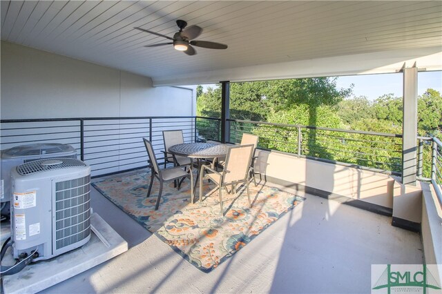 view of patio featuring a balcony, central AC unit, and ceiling fan