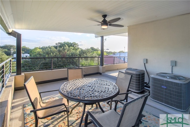 view of patio / terrace with a balcony, central air condition unit, and ceiling fan