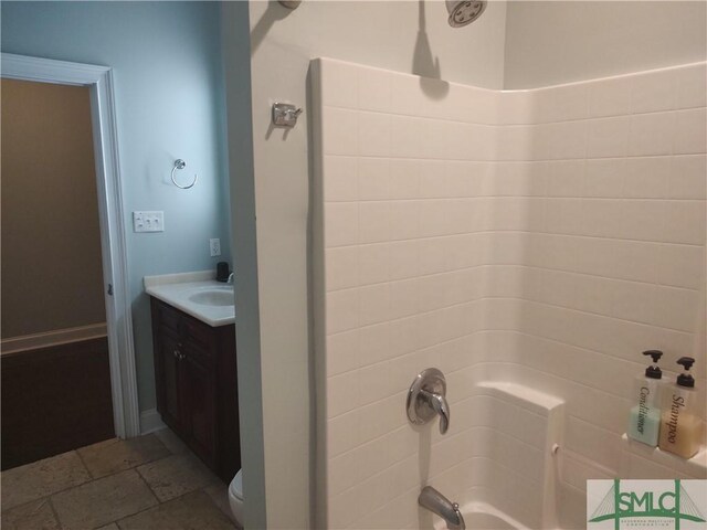 full bathroom with vanity, toilet, and shower / washtub combination