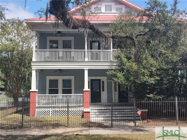 view of front of house featuring a porch, a balcony, and ceiling fan