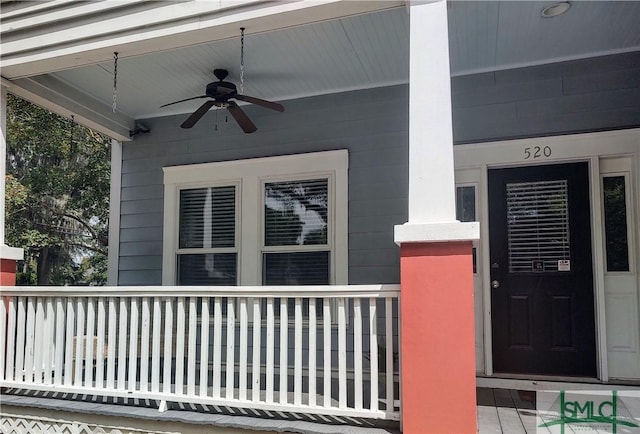 entrance to property with a ceiling fan