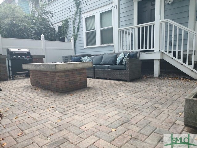 view of patio / terrace featuring an outdoor hangout area and grilling area