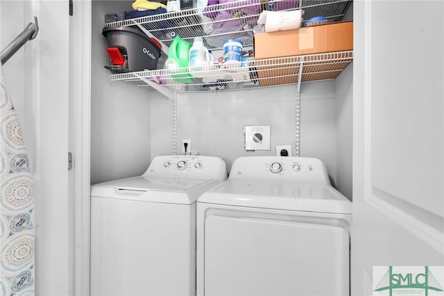 washroom with washer and clothes dryer