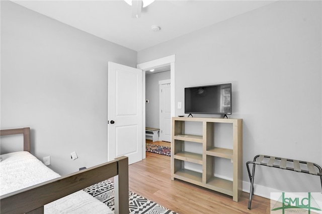 bedroom featuring ceiling fan and light hardwood / wood-style floors