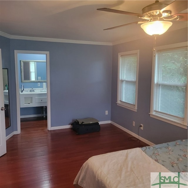 bedroom with ornamental molding, sink, ceiling fan, and dark hardwood / wood-style floors