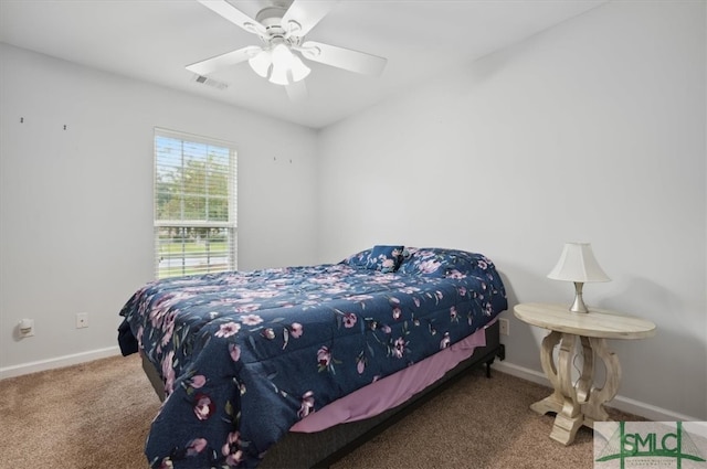 carpeted bedroom with ceiling fan