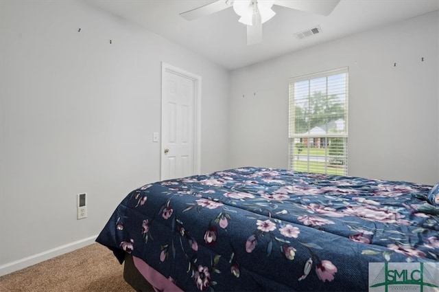 carpeted bedroom featuring ceiling fan