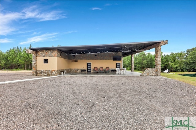 view of front of property with a patio area