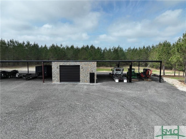 120 Saint Galilee Rd, Midville, GA 30441 - view of car parking featuring a forest view