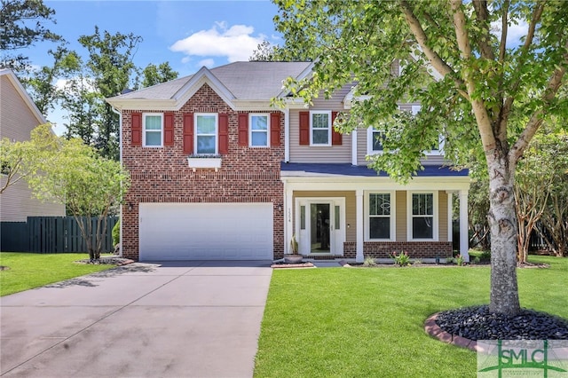 view of front facade with a garage and a front yard