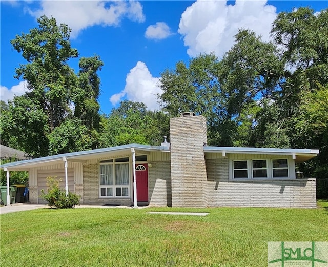 single story home with a garage, a carport, and a front lawn