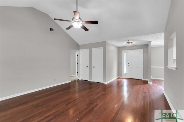 foyer with wood finished floors, visible vents, baseboards, high vaulted ceiling, and ceiling fan