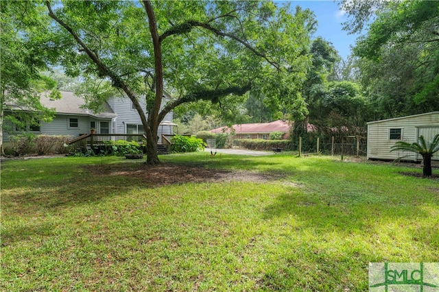 view of yard featuring a deck