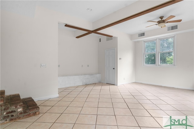 interior space featuring ceiling fan and light tile patterned flooring