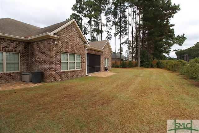 view of property exterior with a yard