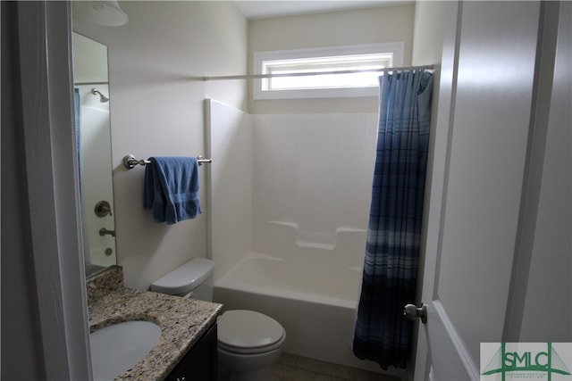 full bathroom with tile patterned floors, shower / bath combination with curtain, toilet, and vanity