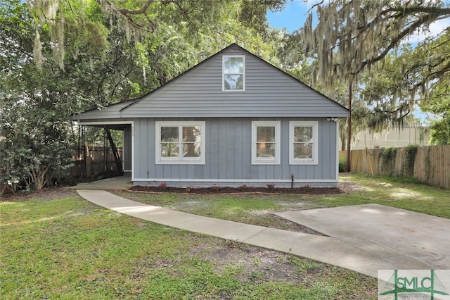 view of property exterior featuring a lawn