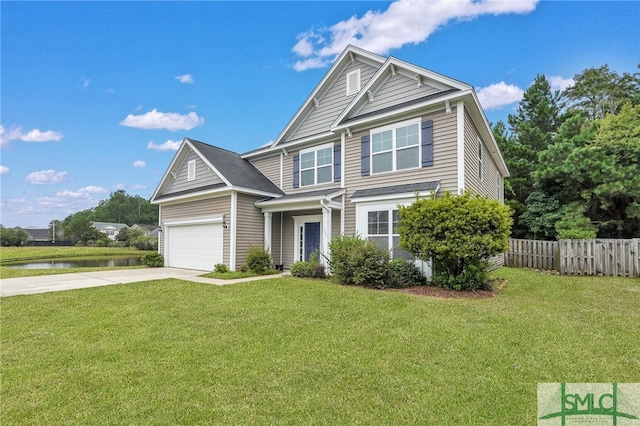 craftsman-style home featuring a garage and a front yard