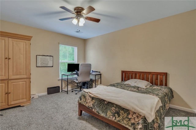 bedroom featuring ceiling fan and carpet floors