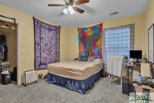 bedroom with ceiling fan and carpet floors