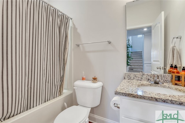 full bathroom with vanity, toilet, and shower / bathtub combination with curtain