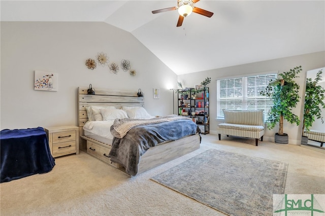 carpeted bedroom with radiator heating unit, lofted ceiling, and ceiling fan