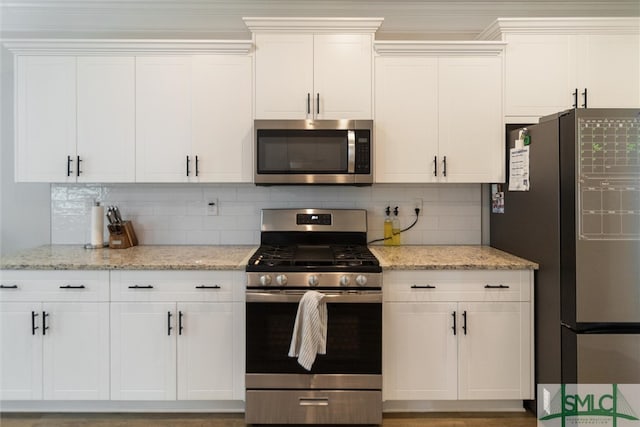 kitchen featuring white cabinetry and stainless steel appliances