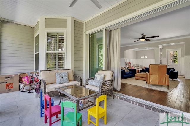 view of patio / terrace with ceiling fan and an outdoor hangout area