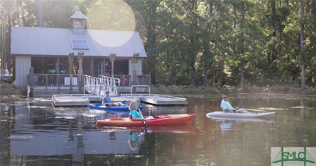 view of dock with a water view