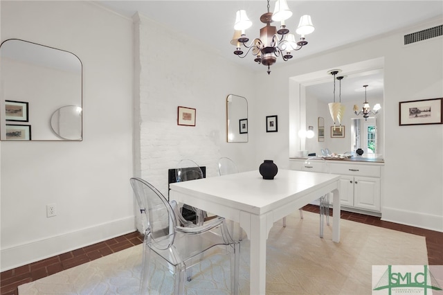 dining area with a chandelier