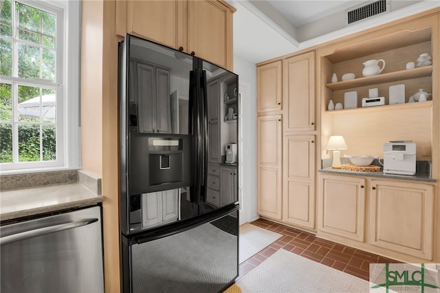 kitchen with black fridge with ice dispenser, light brown cabinets, and stainless steel dishwasher