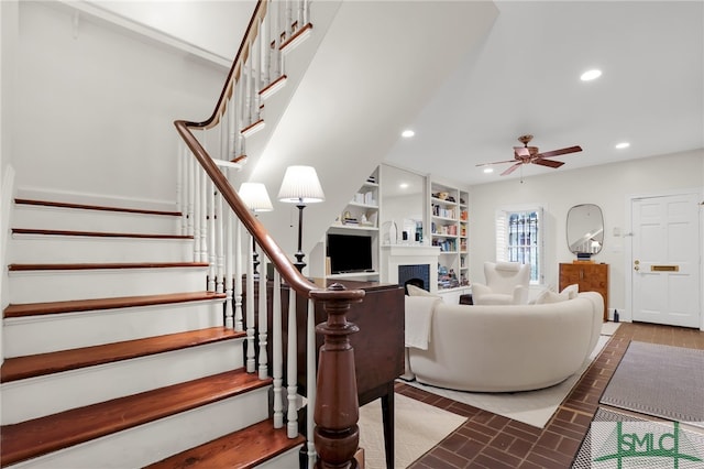 living room featuring ceiling fan