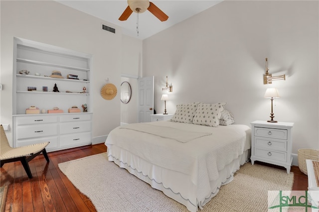 bedroom featuring ceiling fan and hardwood / wood-style floors