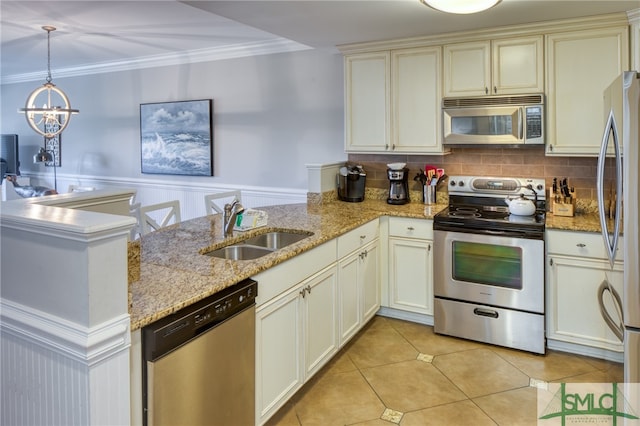 kitchen featuring stainless steel appliances, sink, kitchen peninsula, light tile patterned flooring, and pendant lighting