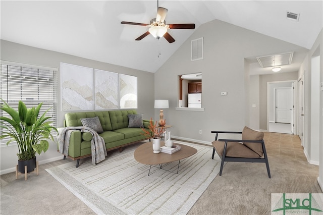 carpeted living room featuring high vaulted ceiling, a healthy amount of sunlight, and ceiling fan