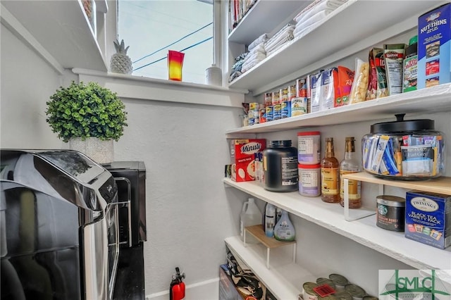 202 E 51st St, Savannah, GA 31405 - storage area featuring washer and clothes dryer